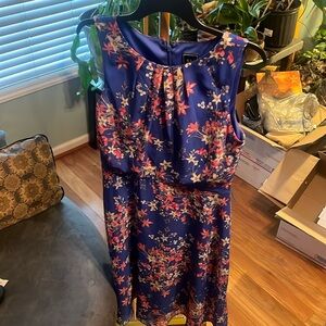 Beautiful belted, blue floral size 10. Pleated neckline, zipped back